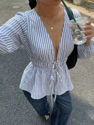 Blusa Eulalia a righe con fiocco frontale
